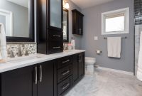 Dark Cabinets White Counter Tops And A Marble Floor Add An Air Of in dimensions 3000 X 2249