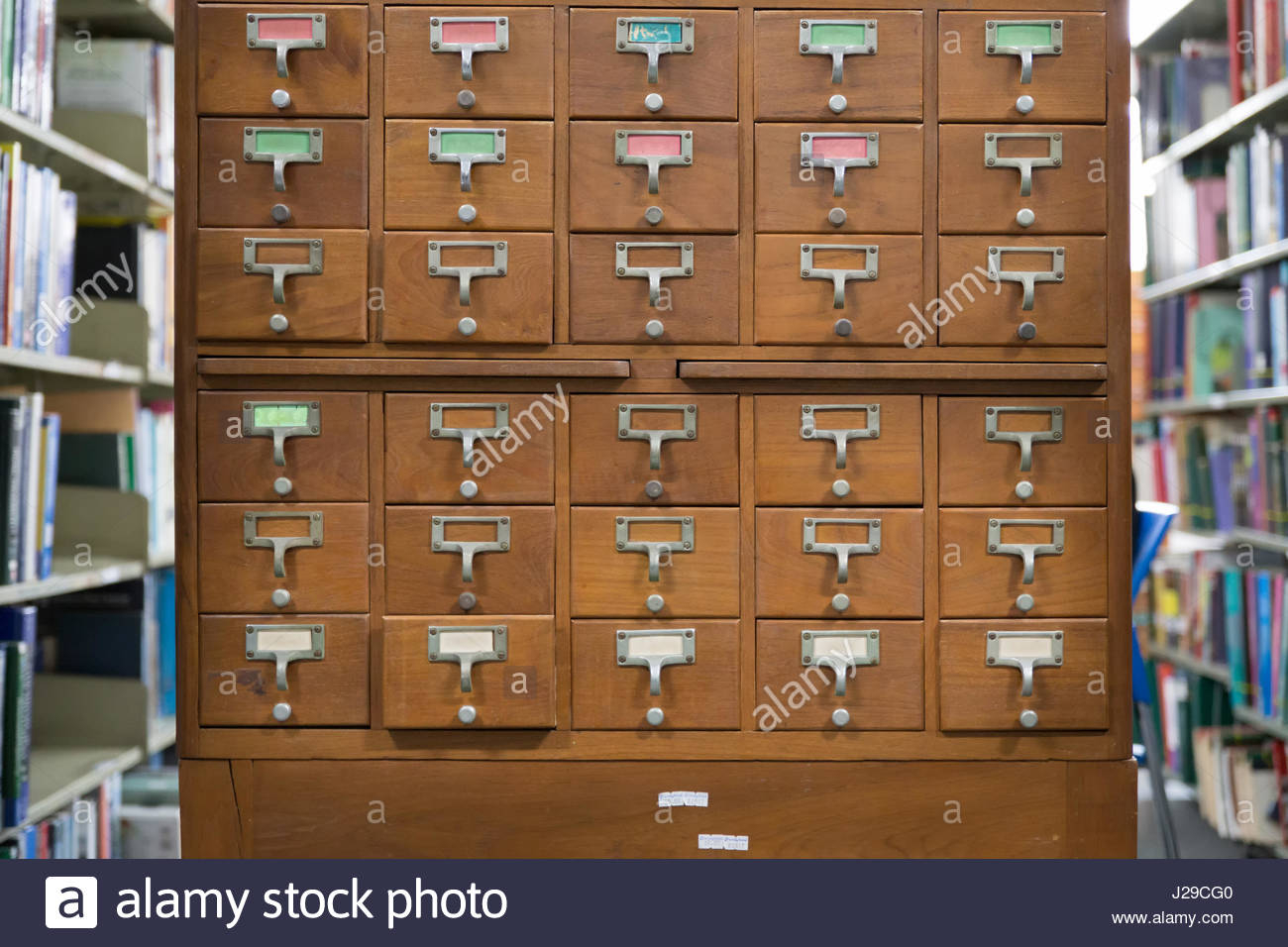 An Old Style Wooden Cabinet Of Library Card Or File Catalog Index within size 1300 X 956
