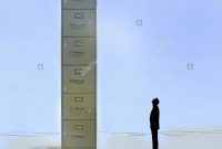 Businessman Looking Up At Huge Filing Cabinet Stock Photo 89448020 within proportions 1300 X 1335