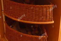 Close Up Of Wicker Storage Baskets In Curved Corner Unit In Modern inside dimensions 842 X 1390