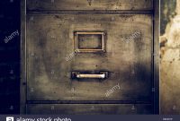 Close Up Photo Of A Distressed Metal Filing Cabinet Stock Photo throughout sizing 1300 X 962