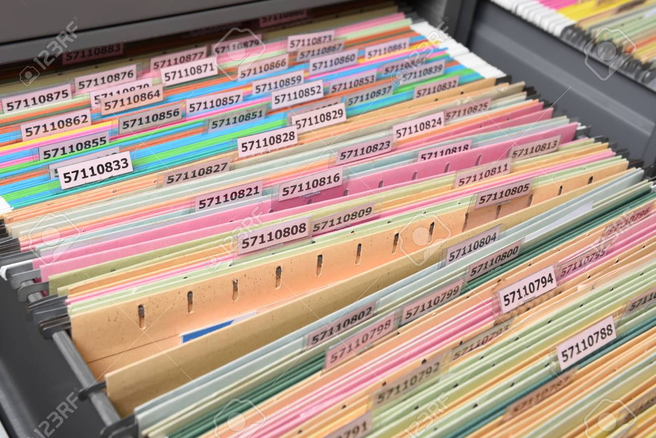 Important Documents Arranged In A File Placed In A Filing Cabinet with proportions 1300 X 867