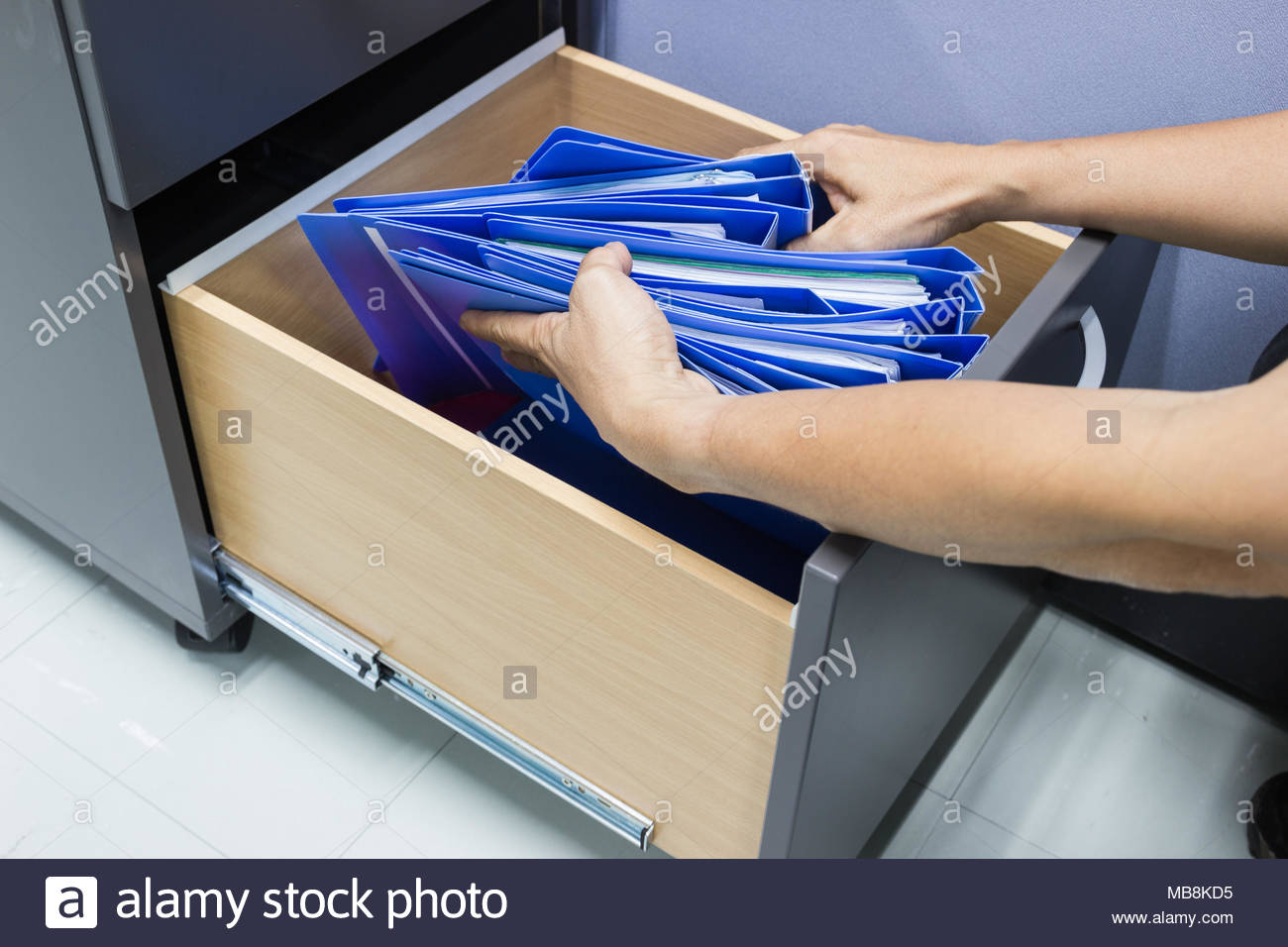 Man Hands Search Files Document In A File Cabinet Retention Of with regard to size 1300 X 956