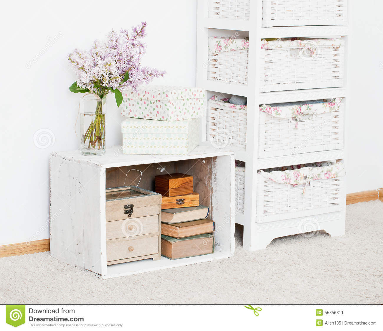 Nightstand With Flowers Storage Boxes And Books Stock Image Image within size 1300 X 1123