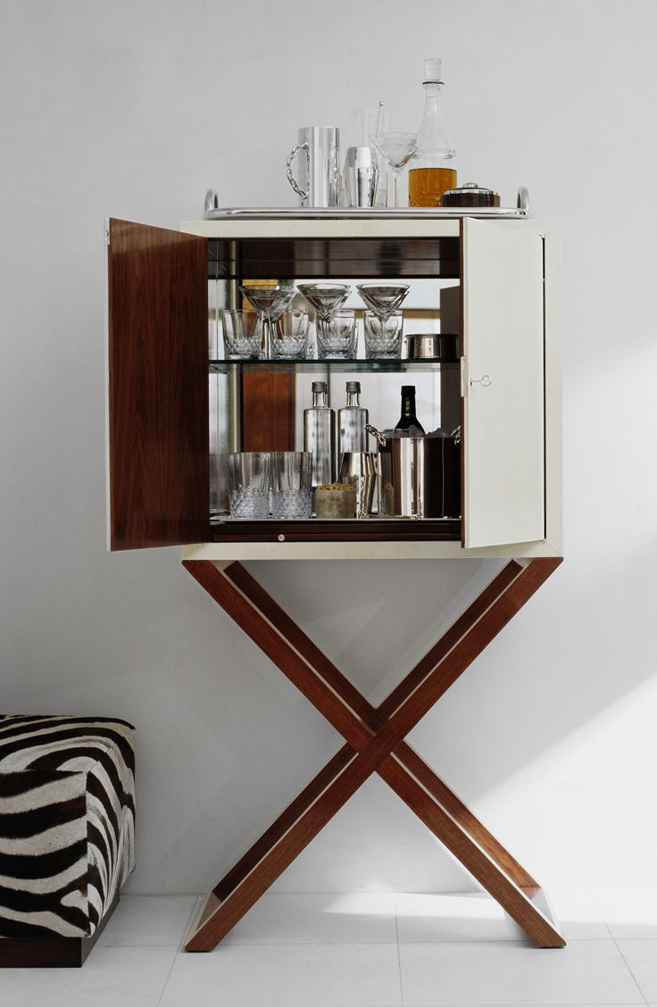 A Chic Bar Cabinet Reveals The Makings Of Cocktail Hour intended for proportions 736 X 1128