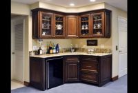 Two Wall Corner Wet Bar With Dark Cabinetry And Light with regard to proportions 1280 X 720