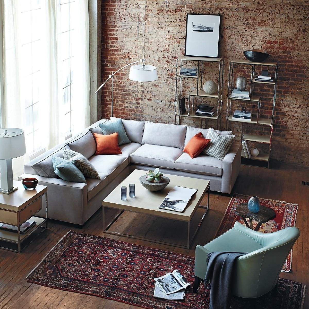 Interesting White Corner Sofa Design With Brick Stone Wall in measurements 1200 X 1200
