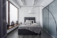 Modern Bedroom With Floor Lamp Wardrobe And Double Bed regarding size 1300 X 866