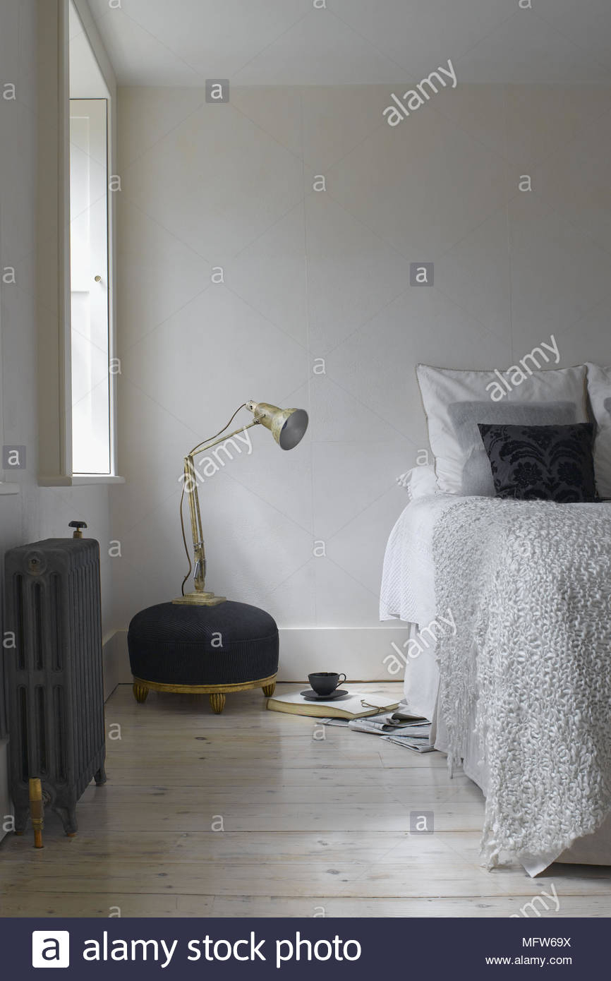 White Bedroom With A Large Floor Lamp Next To Radiator And pertaining to measurements 866 X 1390