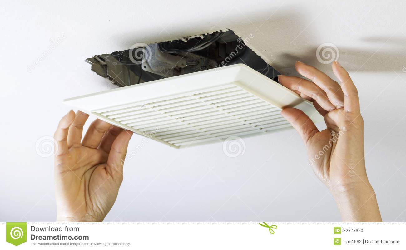 Removing Bathroom Fan Vent Cover To Clean Inside Stock Photo regarding sizing 1300 X 801