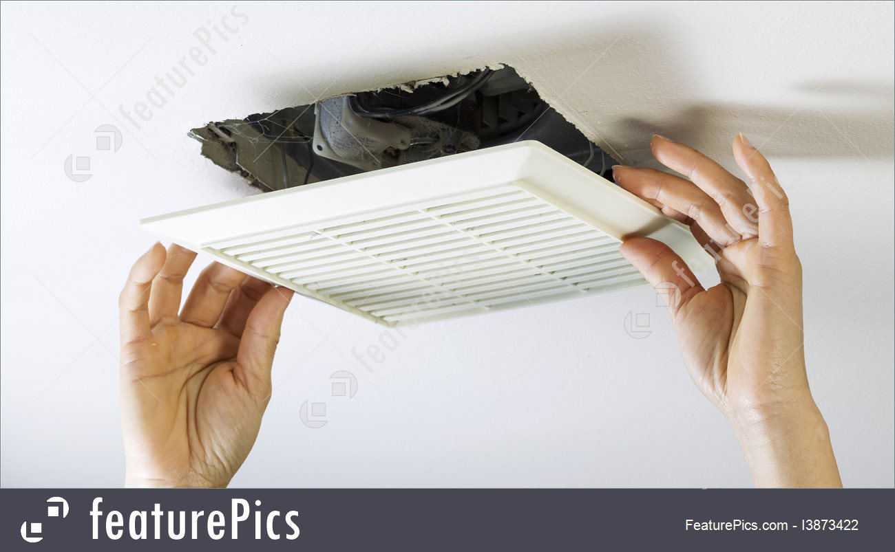 Removing Bathroom Fan Vent Cover To Clean Inside Stock Picture I3873422 At Featurepics throughout sizing 1300 X 803